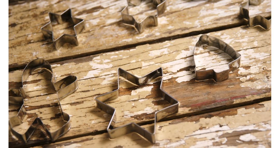 Festive Cookie Cutters on Rustic Wooden Background