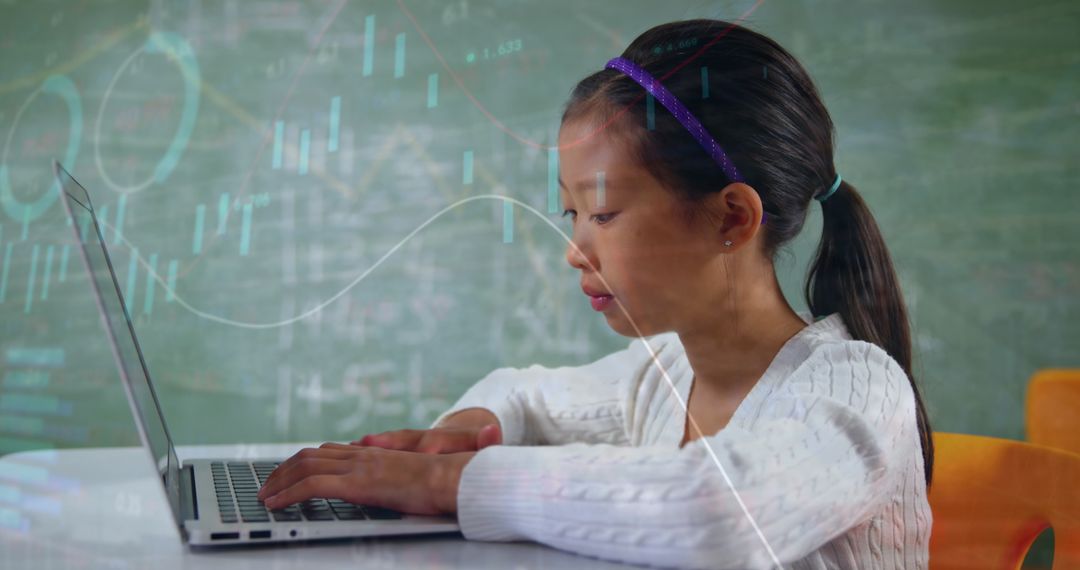 Young Girl Learning on Laptop with Data Overlays in Classroom