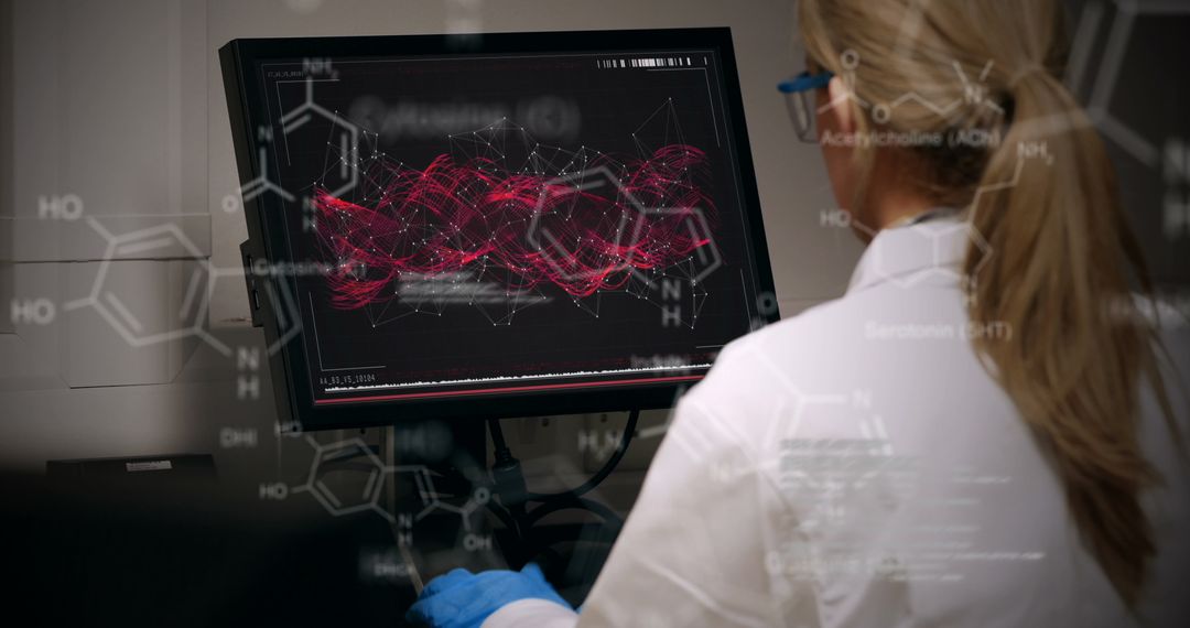 Female Scientist Analyzing Data on Computer Screen