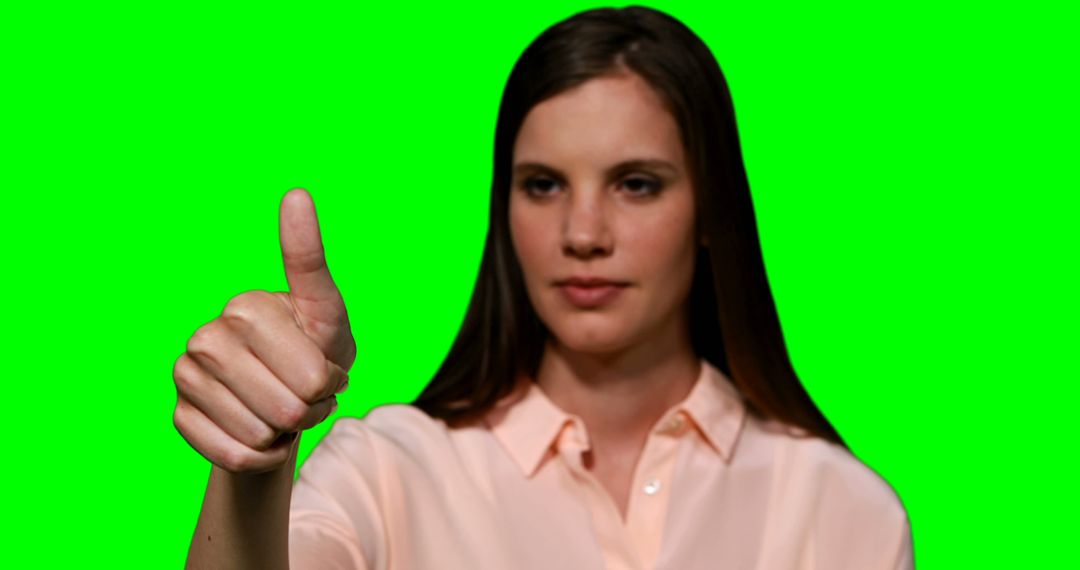 Woman Giving Thumbs Up Gesture Isolated on Green Screen Background - Free Images, Stock Photos and Pictures on Pikwizard.com