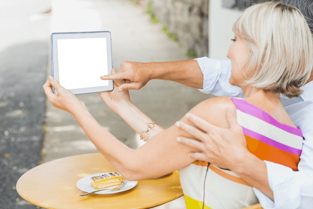 Two People Taking Outdoor Selfie with Tablet Transparently