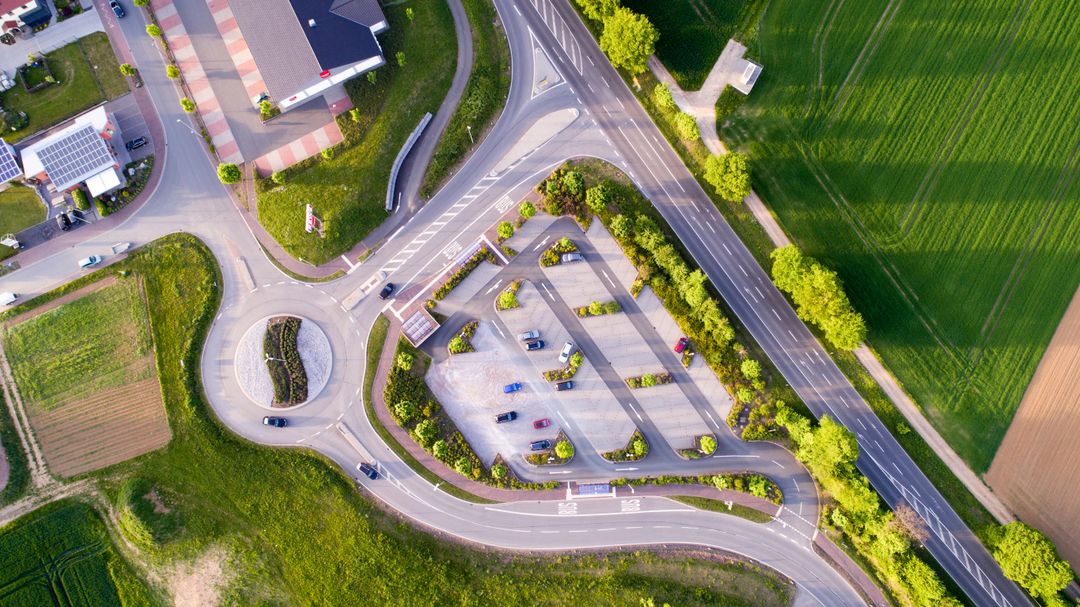 Aerial View of Rural Road Intersection with Parking Area