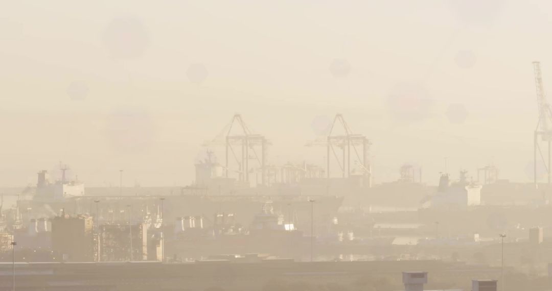 Coastal Gantry Cranes in Foggy Harbor Silhouette