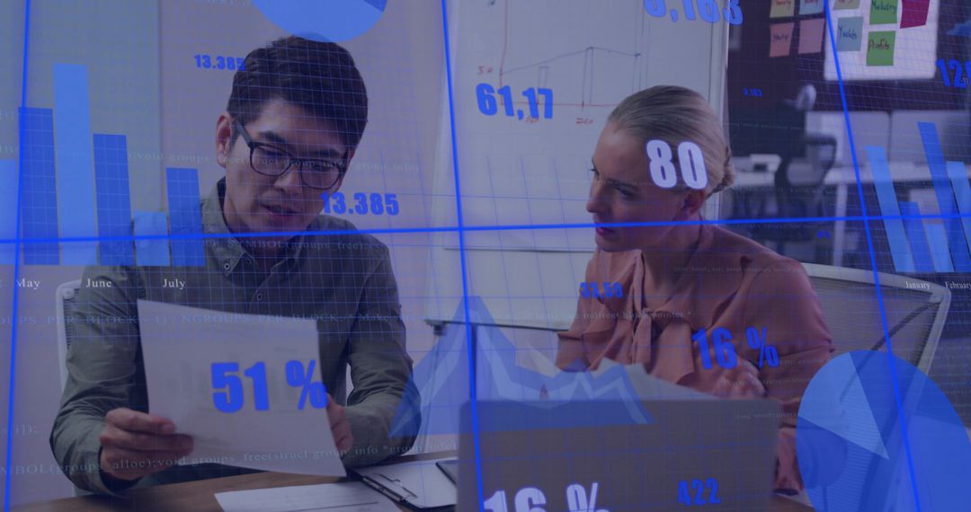 Business Professionals Analyzing Reports with Data Overlays