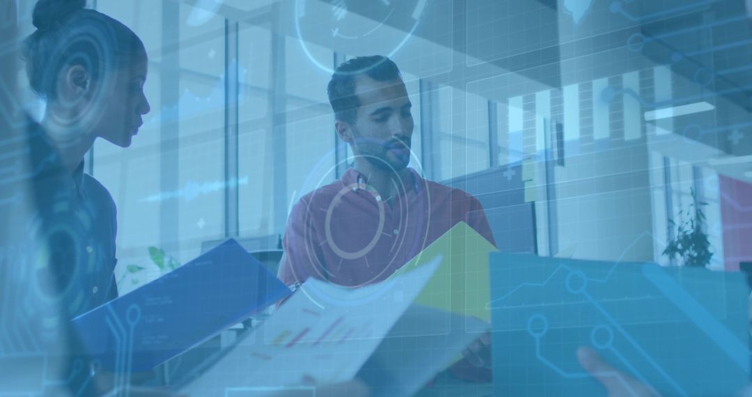 Diverse Team Analyzing Data Visualizations in Modern Office Environment