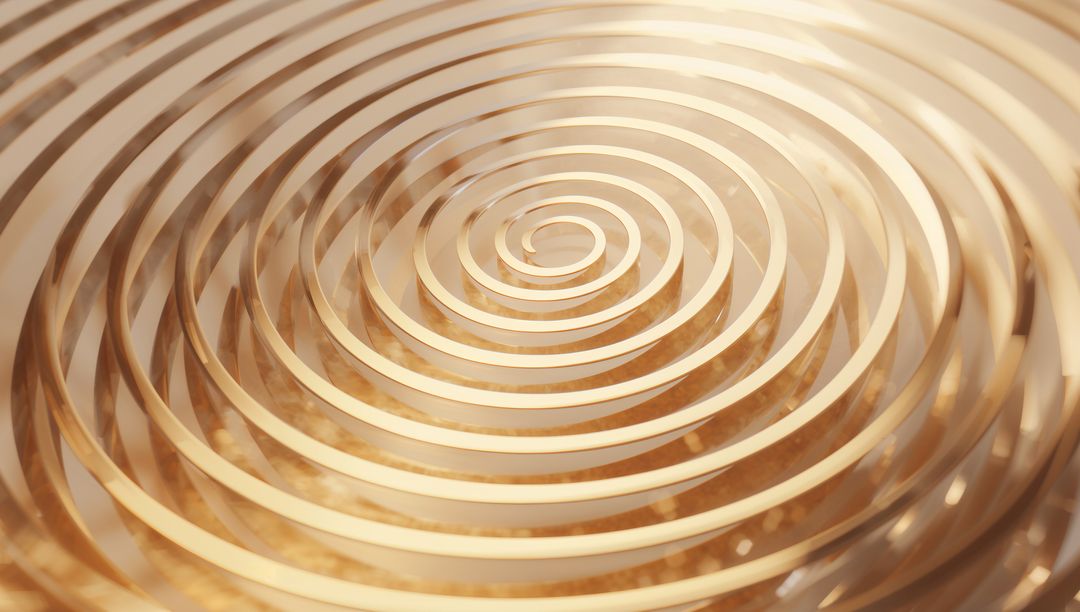 Polished Golden Spiral Coil Creating Concentric Metallic Rings and Warm Reflective Highlights