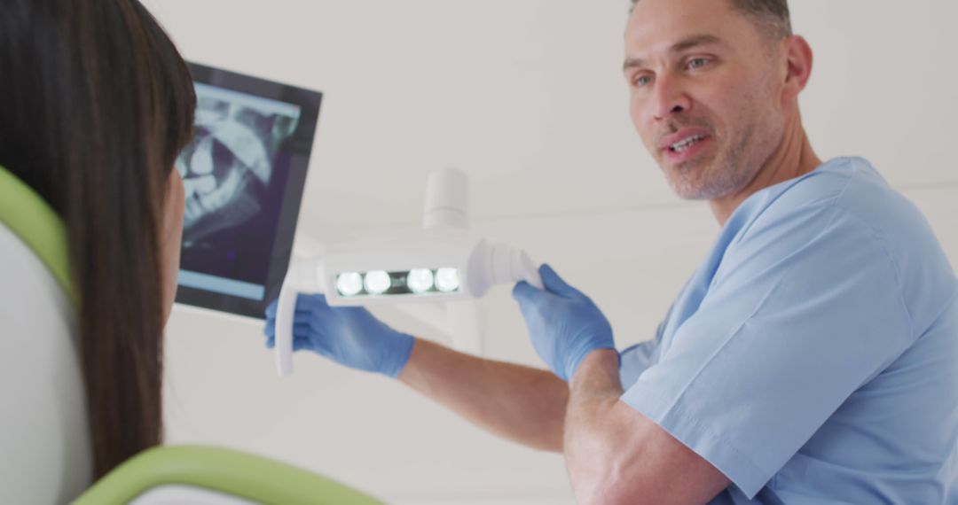 Dentist Explaining X-ray Results to Patient - Free Images, Stock Photos and Pictures on Pikwizard.com