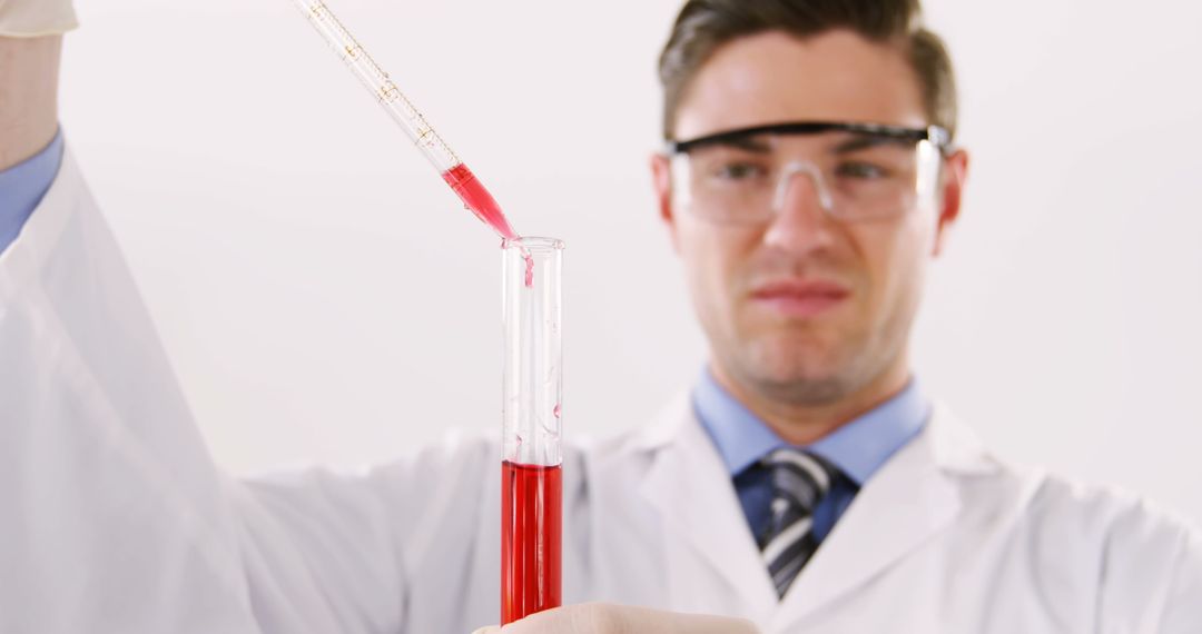 Lab Technician Examining Blood Sample with Careful Precision