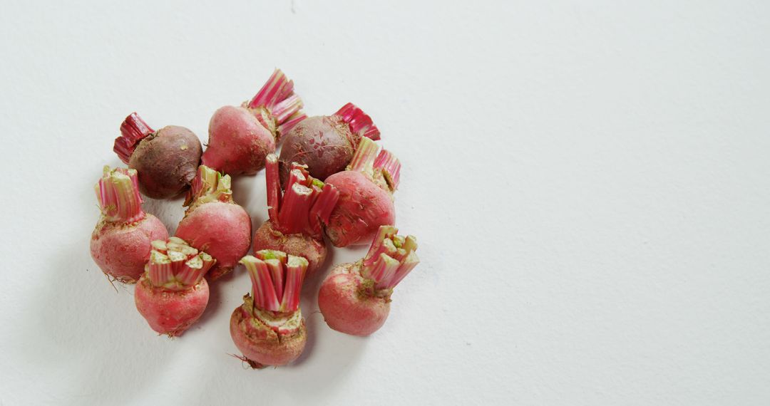 Fresh Beetroot Bulbs on White Surface - Free Images, Stock Photos and Pictures on Pikwizard.com