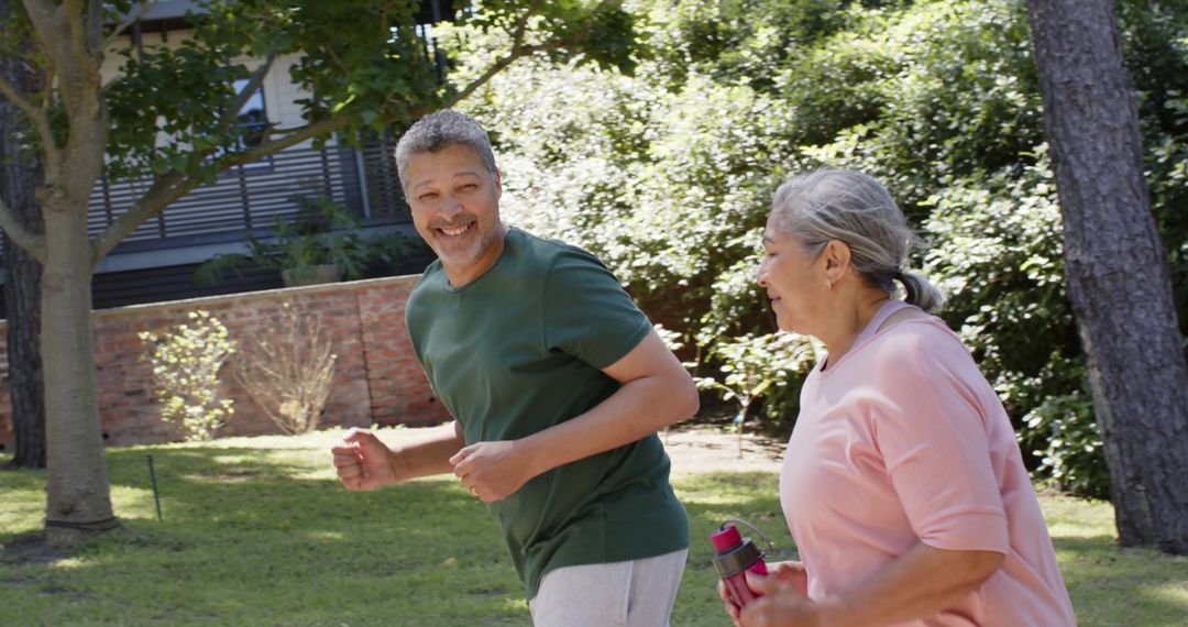 Seniors Enjoying a Refreshing Run in Nature