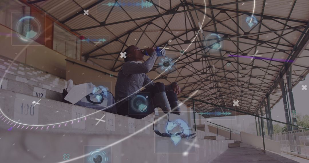 Disabled Athlete Hydrating Amid Digital Interface