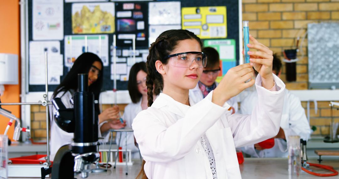 Students in Science Class Conducting Chemistry Experiment - Free Images, Stock Photos and Pictures on Pikwizard.com