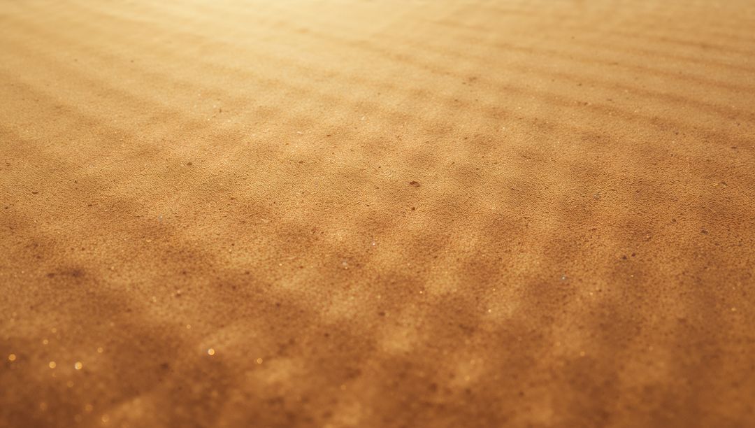 Golden Sand Ripples in Desert Landscape Creating Flowing Patterns