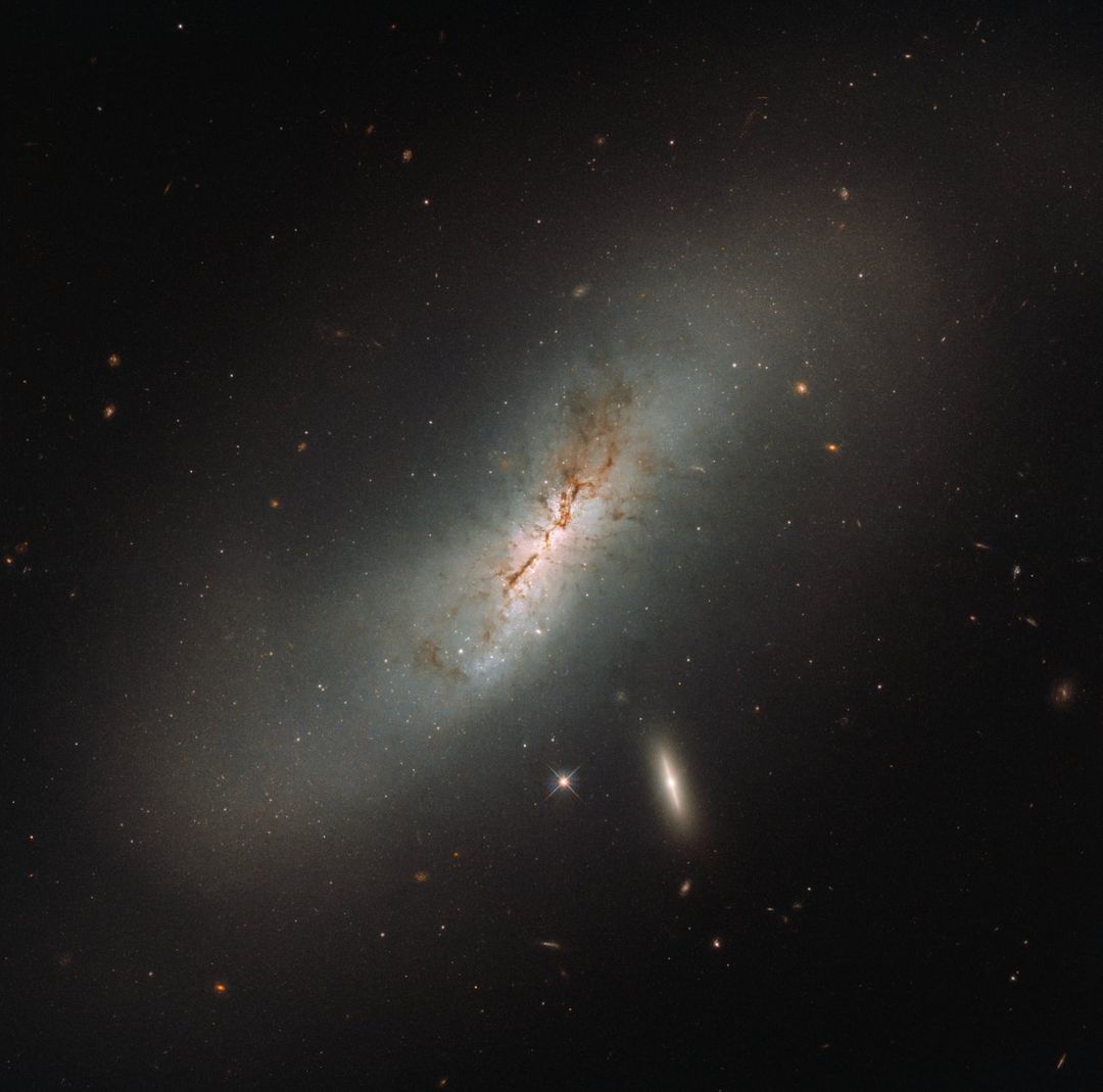 Hubble's makes a double galaxy gaze - Free Images, Stock Photos and Pictures on Pikwizard.com