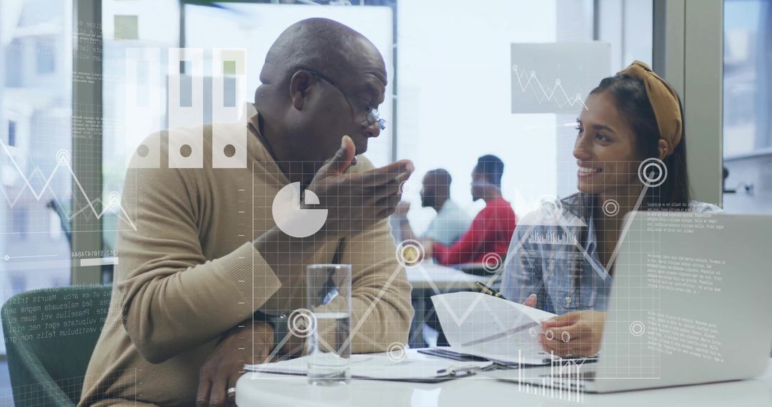 Consultants Collaborating Reviewing Data with Modern Visuals