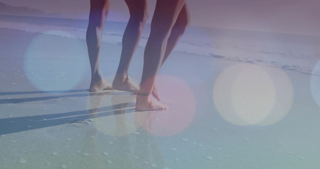 Couple Walking on Beach with Soft Focus Bokeh Effect