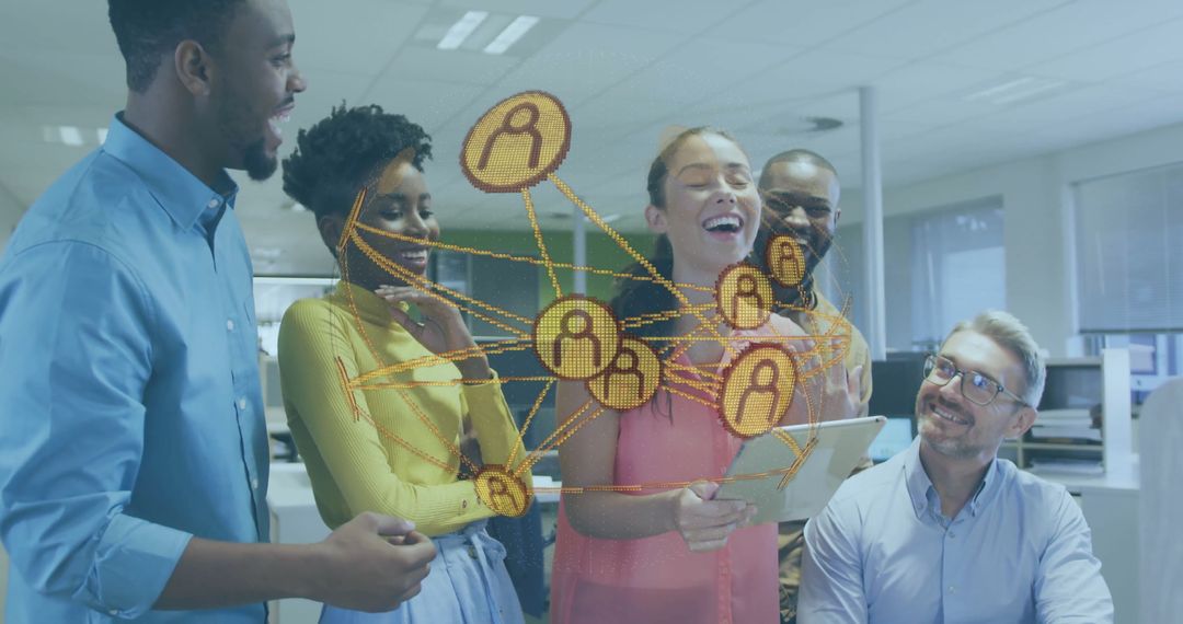 Diverse Team Analyzing Data Network in Modern Office Environment