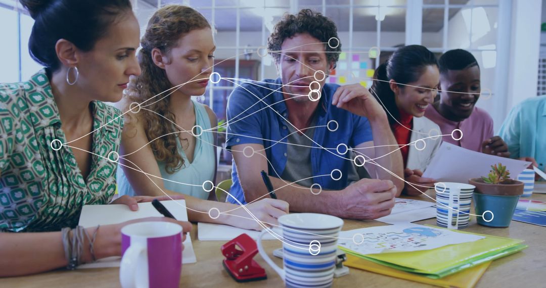 Diverse Team Engaged in Creative Collaboration in Office