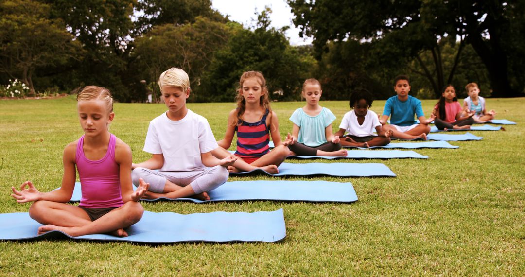 Children Practicing Yoga Meditation Outdoors in Park - Free Images, Stock Photos and Pictures on Pikwizard.com