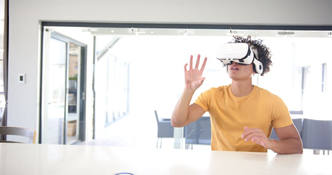Man Immersed in Virtual Reality at Home with VR Headset