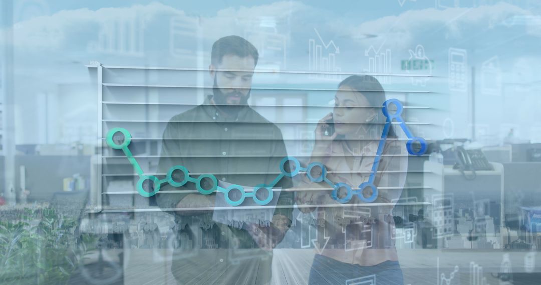 Business Colleagues Analyzing Data and Collaborating in Modern Office