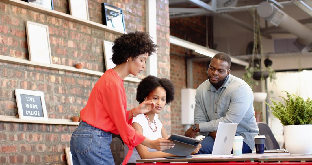 Diverse Team Collaborating in Modern Loft Office Setting
