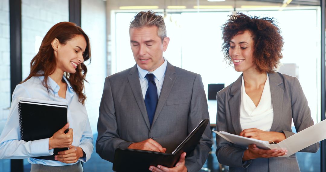 Successful Business Team Collaborating in Modern Office Environment