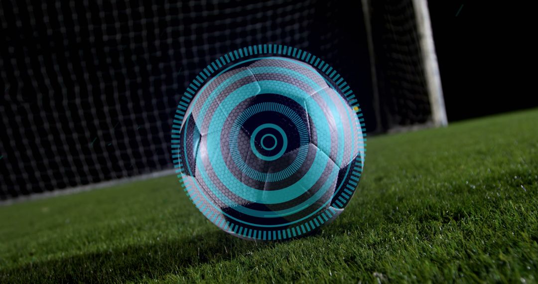 Digital Tech Overlay on Soccer Ball Near Goal at Night - Free Images, Stock Photos and Pictures on Pikwizard.com