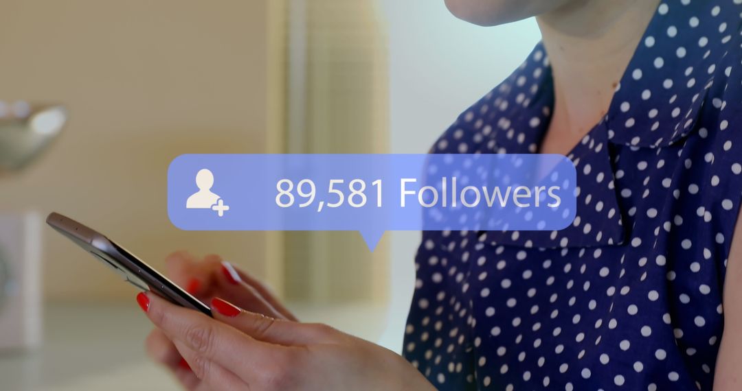 Woman Checking Social Media Follower Count on Smartphone
