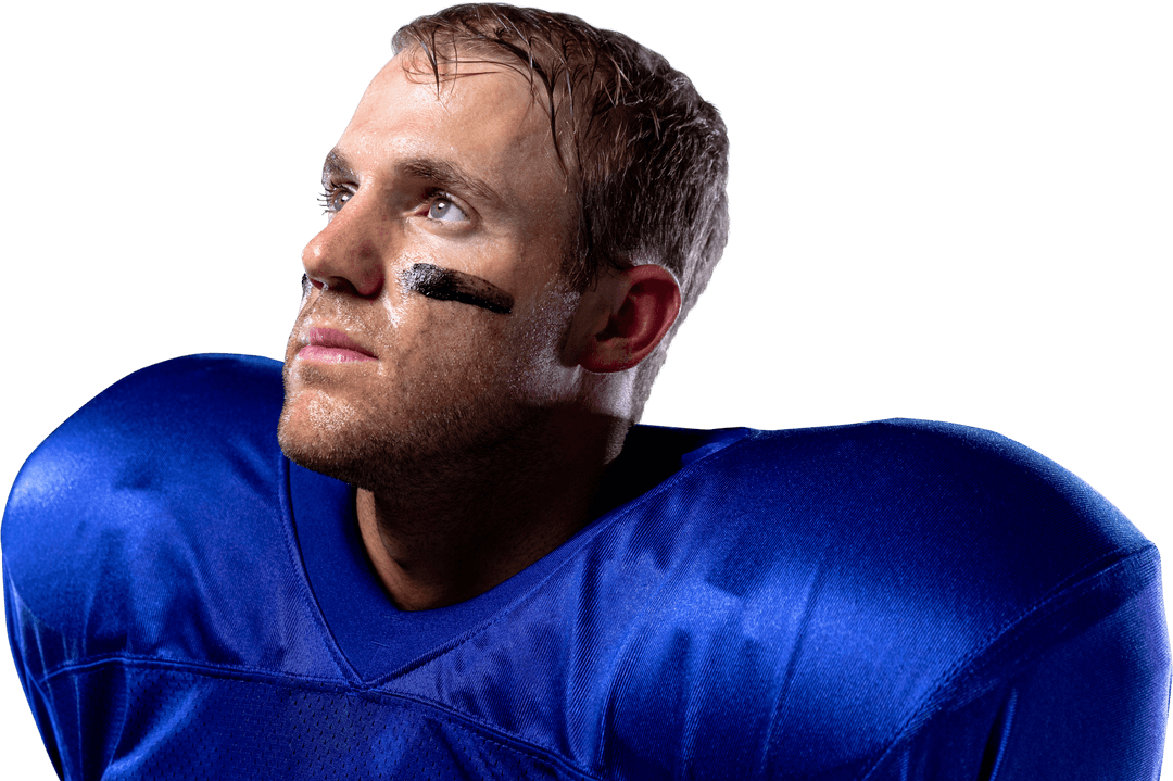 Focused American Football Player Looking Up in Uniform Transparent Background