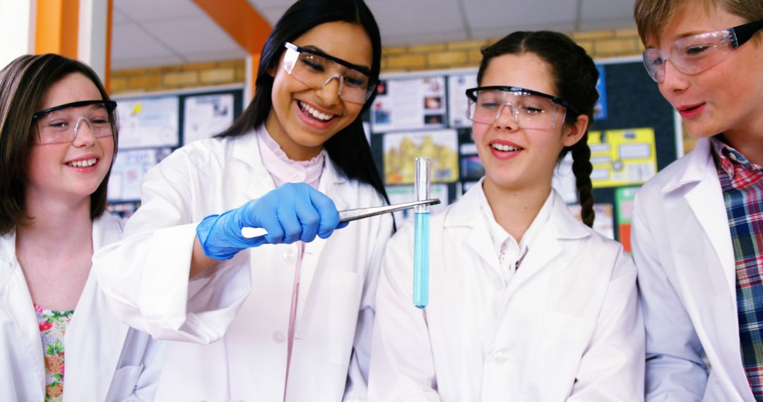 Students Conducting Chemistry Experiment in Classroom