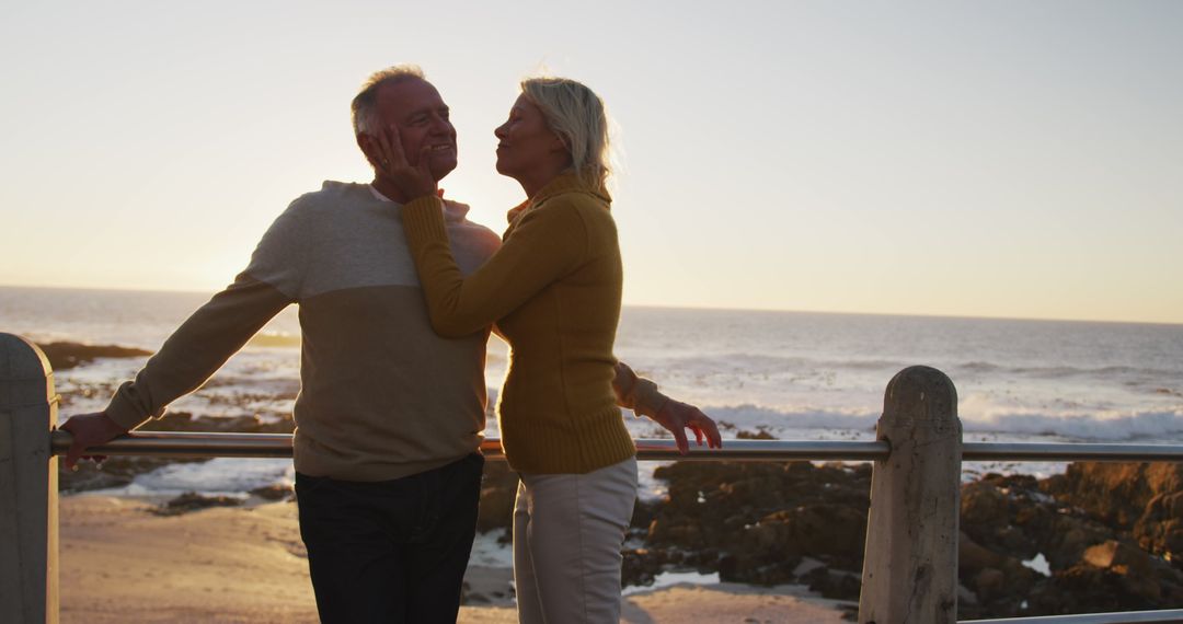 Senior Couple Enjoying Sunset at Beach Promenade - Free Images, Stock Photos and Pictures on Pikwizard.com