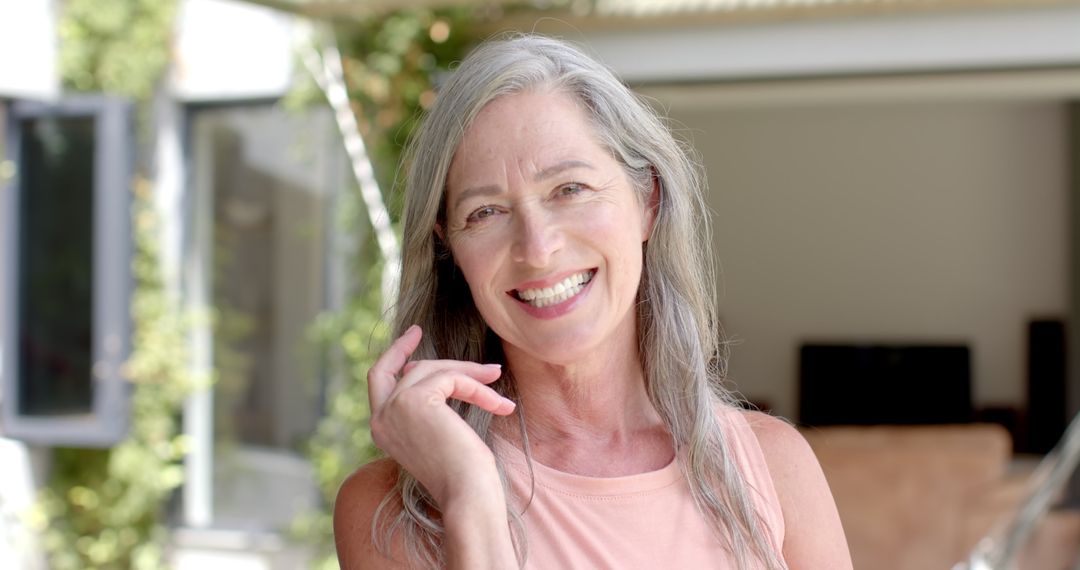 Happy Senior Woman with Grey Hair and Natural Smile