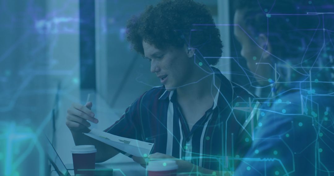 Team Discussing Data Insights with Digital Visualization Elements