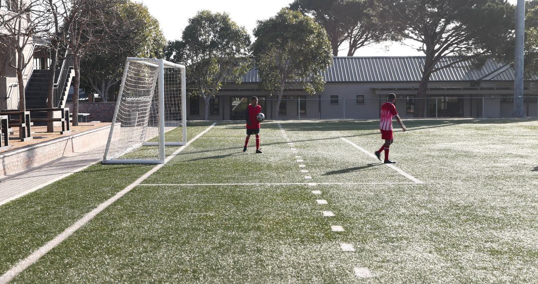 Youth Soccer Players Celebrating Goal with Ref on Field
