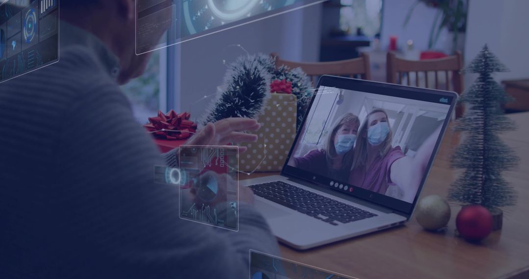 Senior Man Using Laptop for Holiday Video Call with Masked Family and AR Interface