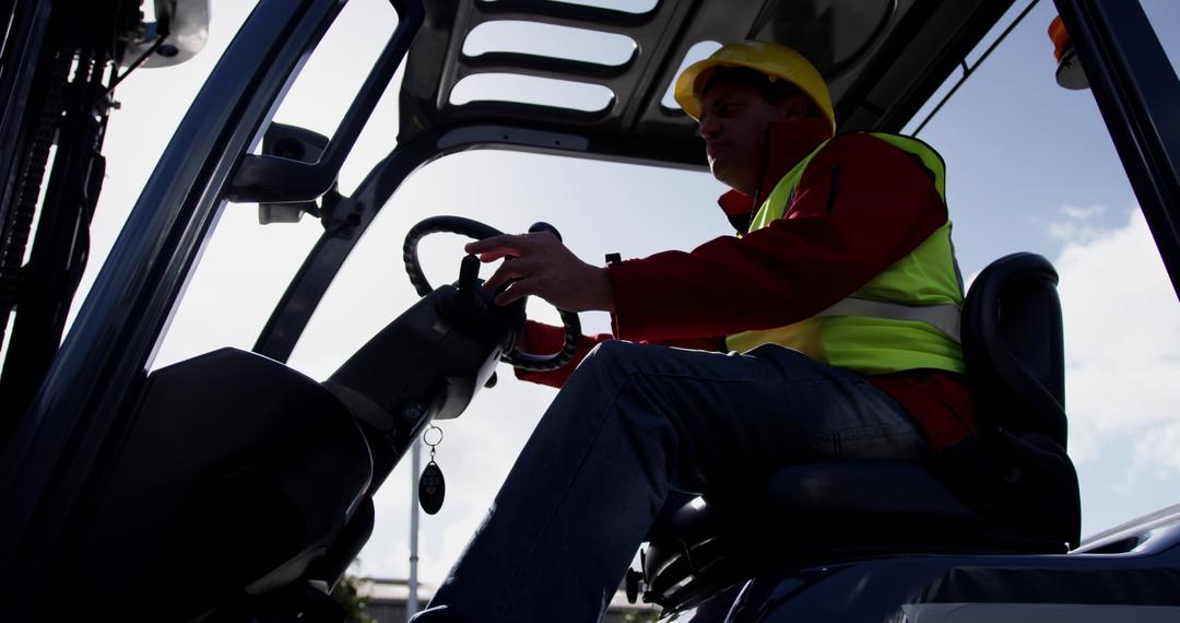 Forklift Operator Safely Handling Equipment in Warehouse - Free Images, Stock Photos and Pictures on Pikwizard.com