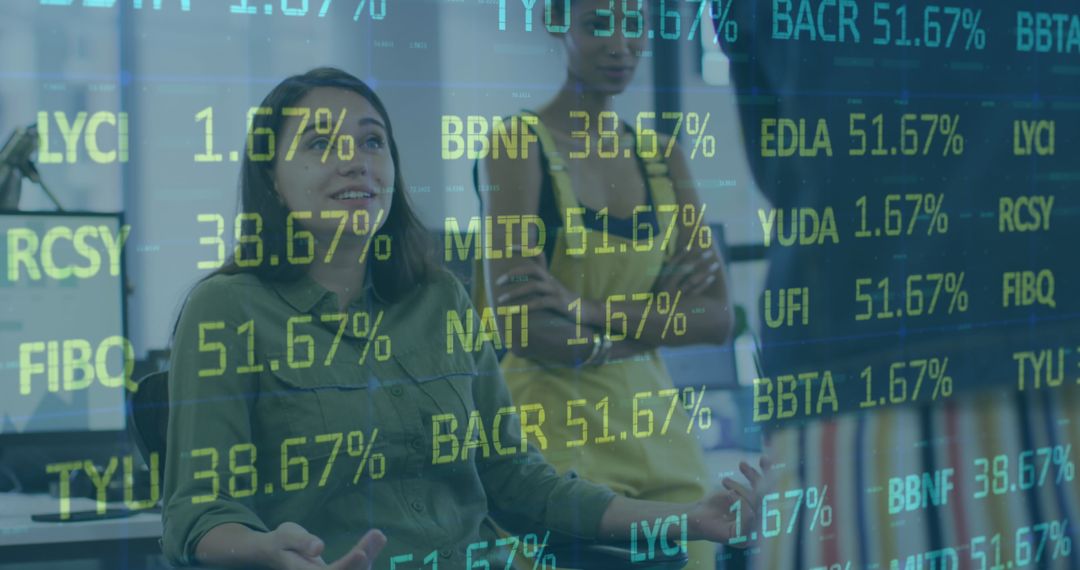 Two Female Colleagues Discussing Underlaying Stock Market Data Visualization