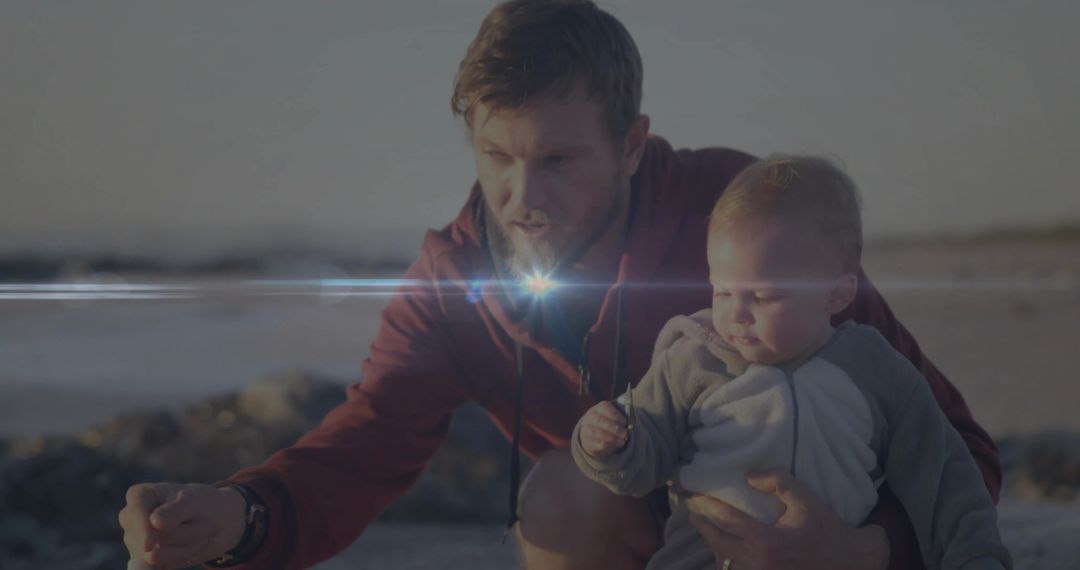 Father and Baby Bonding on Tranquil Beach Exporation