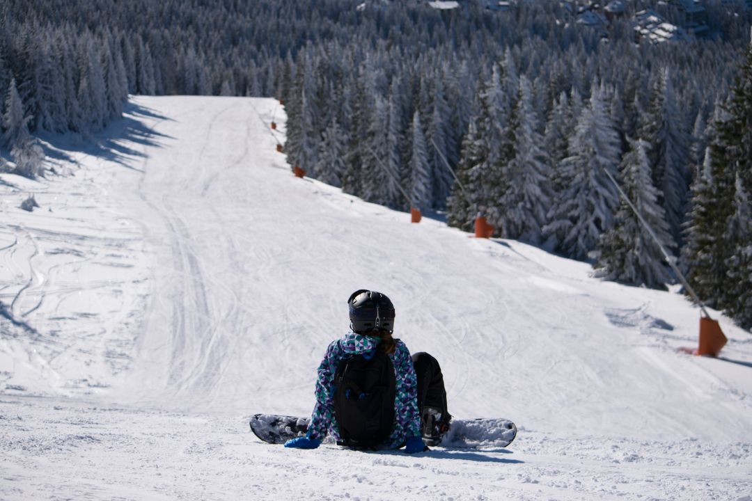 Snowboarder Sitting on Snowy Slope, Winter Mountain Landscape - Free Images, Stock Photos and Pictures on Pikwizard.com