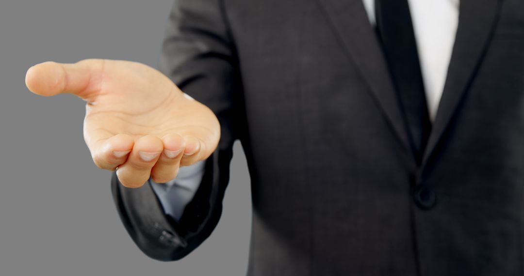 Businessman Offering Gesture with Open Hand