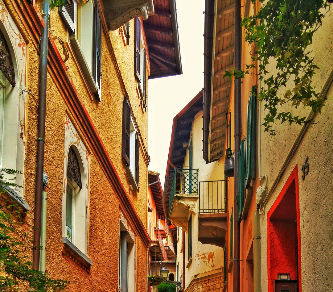 Charming Narrow European Street with Colorful Buildings - Free Images, Stock Photos and Pictures on Pikwizard.com