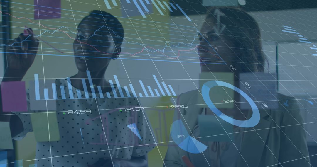 Diverse Business Team Analyzing Data and Taking Notes