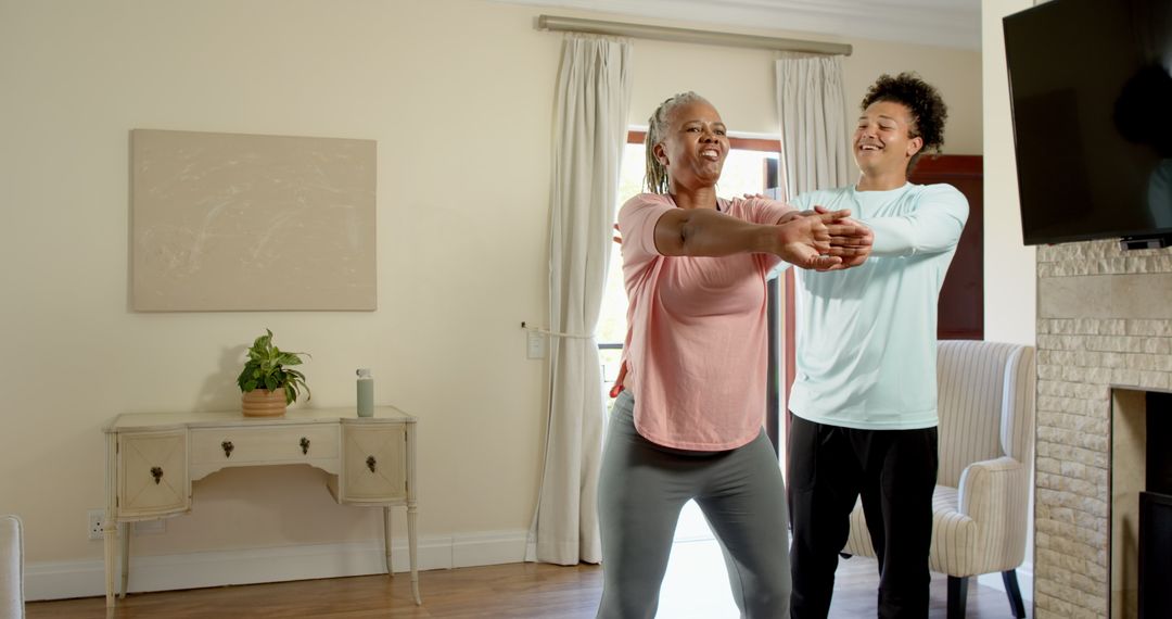 Senior Mother and Son Bonding During Home Exercise Routine