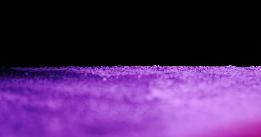 A close-up of a purple textured surface under a dark background - Free Images, Stock Photos and Pictures on Pikwizard.com