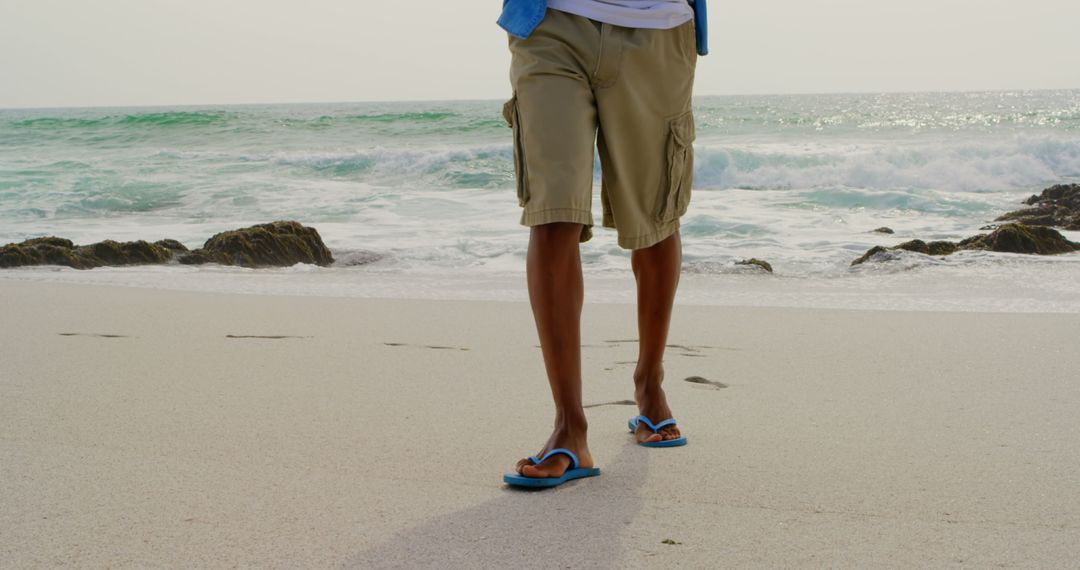 Casual Walk on Beach with Ocean Waves