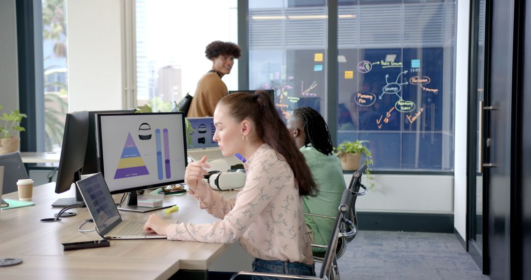 Diverse Team Engaged in Creative Office Workspace