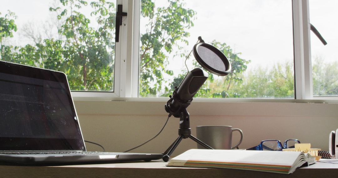 Home Studio Setup Sundrenched Workspace with Microphone and Laptop