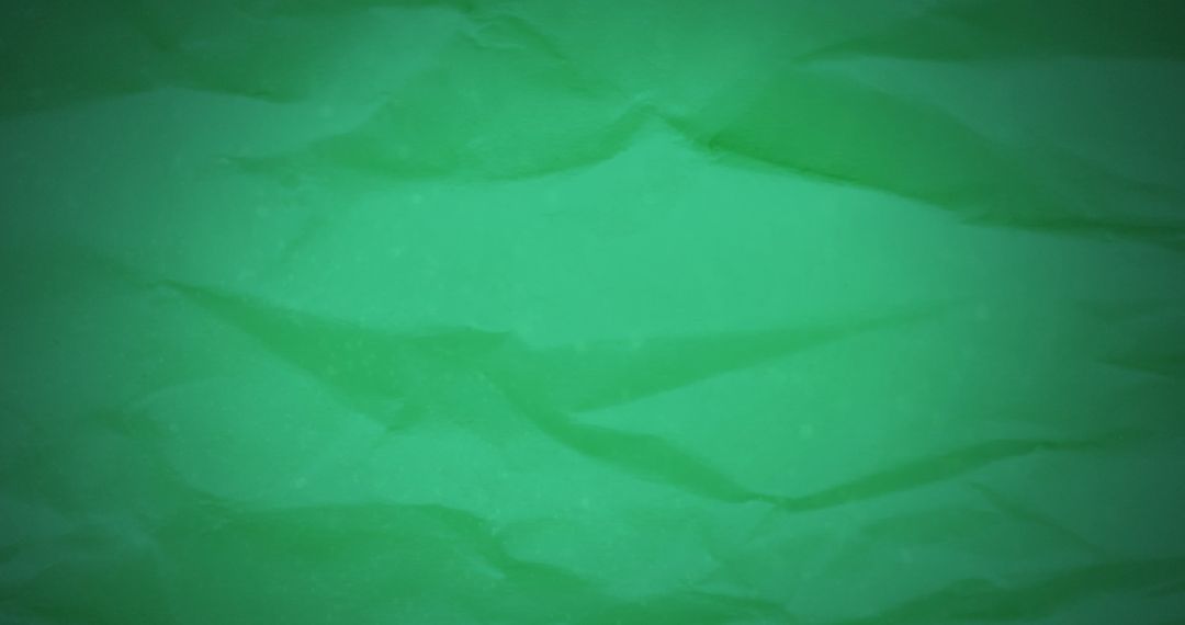 Green Textured Fabric Background with Wave Patterns