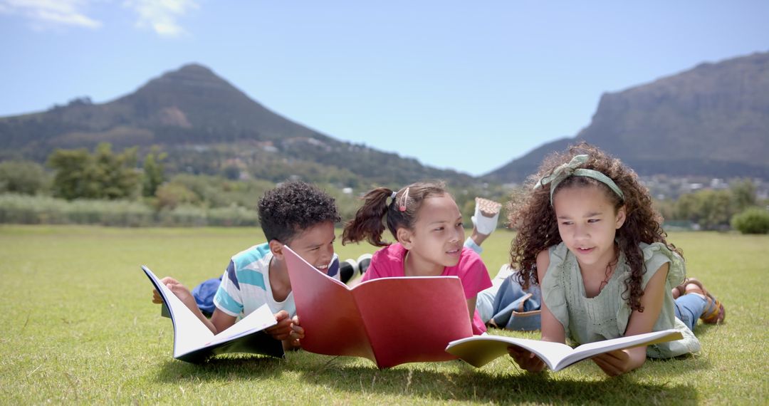 Multicultural Children Reading Books in Scenic Nature Landscape